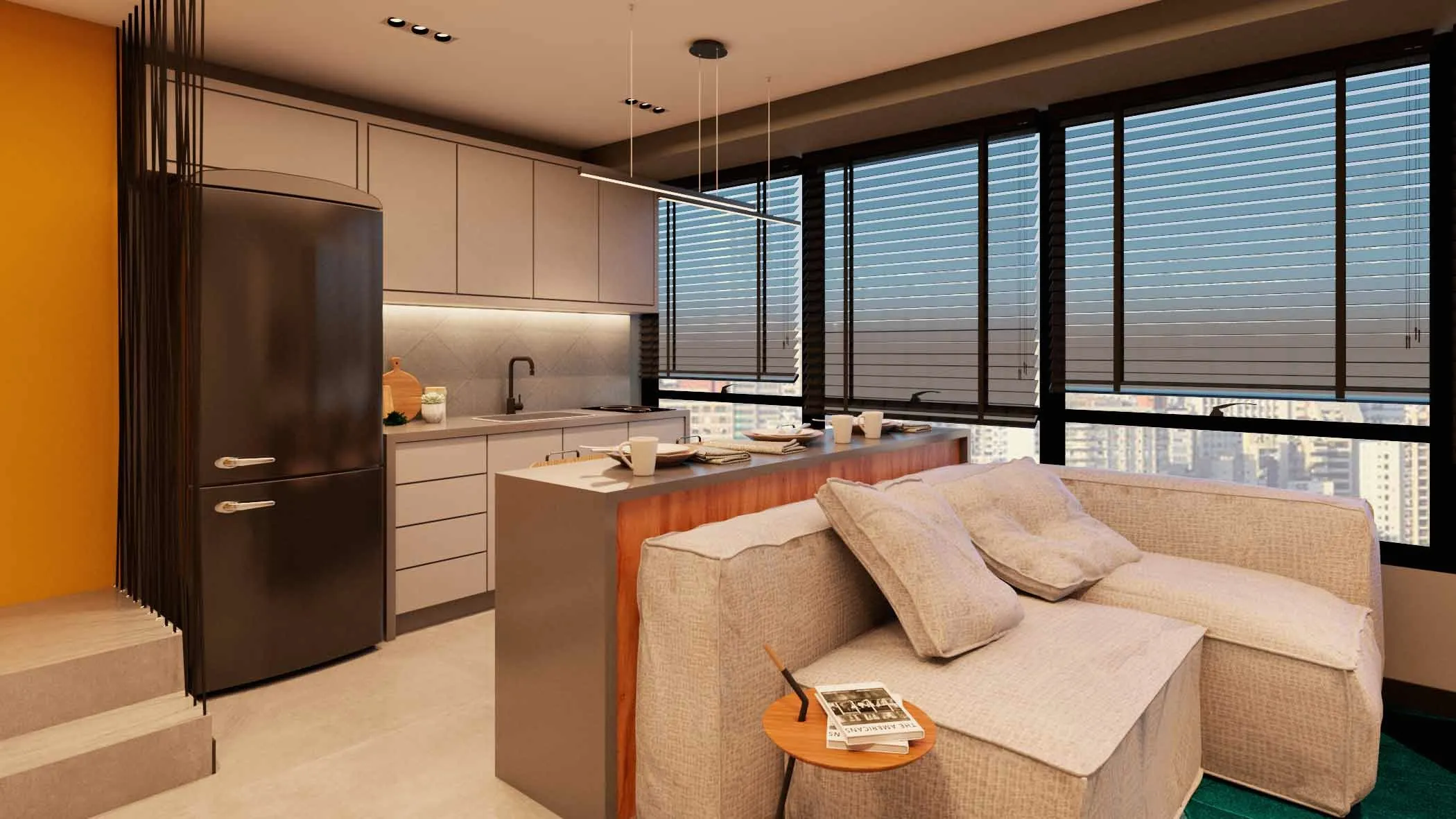 Cozinha e estar integrados num studio com janelas amplas